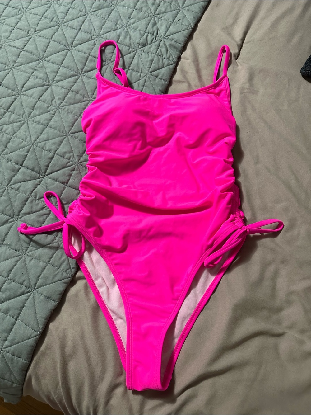 Never worn tie-side one piece